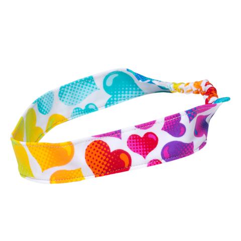Baby girl headband with cute heart pattern by FASTEN. Heart headband also fits toddlers and school age girls.