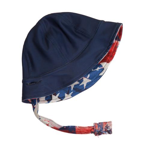 Reversible toddler hat by FASTEN. Cute American print with stars. Solid indigo hat. Magnetic chin strap to keep on head. Unisex hat can be worn by toddler boys and girls.