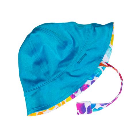 FASTEN reversible toddler hat with adorable rainbow hearts print on one side, turquoise on the other side. UPF 50+ sun hat providing excellent sun protection. Great for the beach or pool or when your toddler is outside. Chin strap to keep hat on your toddler's head!